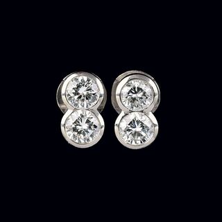 A Pair of high carat Solitaire Diamond Earstuds