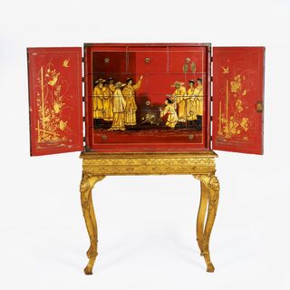 A Chinese Export Red Lacquer Cabinet on Stand