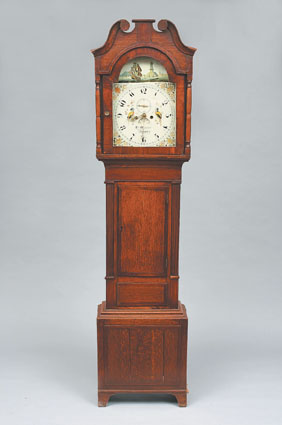 An english longcase clock in mahogany and oak