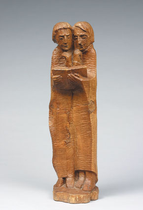 A large figuregroup 'Reading couple'