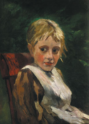 Portrait of a sitting girl in a garden