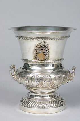 A large russian wine cooler with coat of arms and eagle ornament