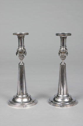 A pair of candle holders of Empire period