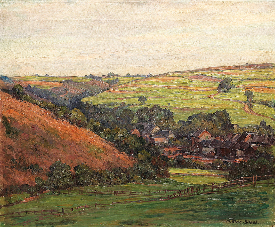 "A hilly landscape and a village in the 'Eifel"