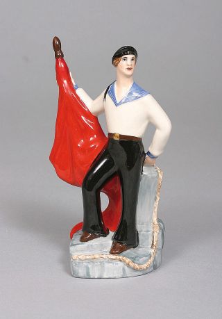 Figur eines Matrosen mit Fahne