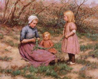 Junge Mutter und zwei Töchter, eine Girlande in den Dünen flechtend