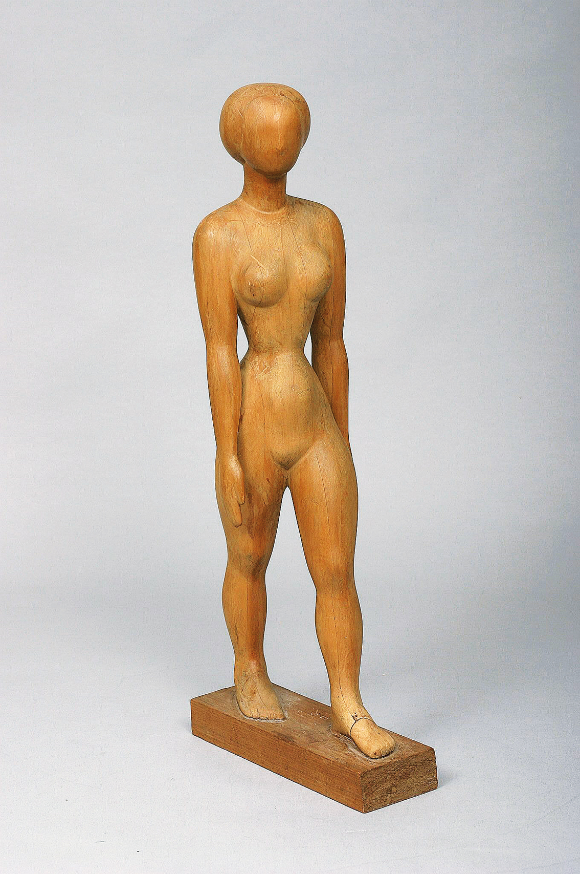 A rare modern wood sculpture 'Female nude, walking'