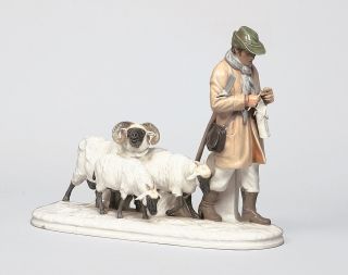 An art nouveau group 'Shepherd with his flock of sheep'