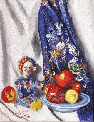 A still life with a doll, a blue curtain and red apples