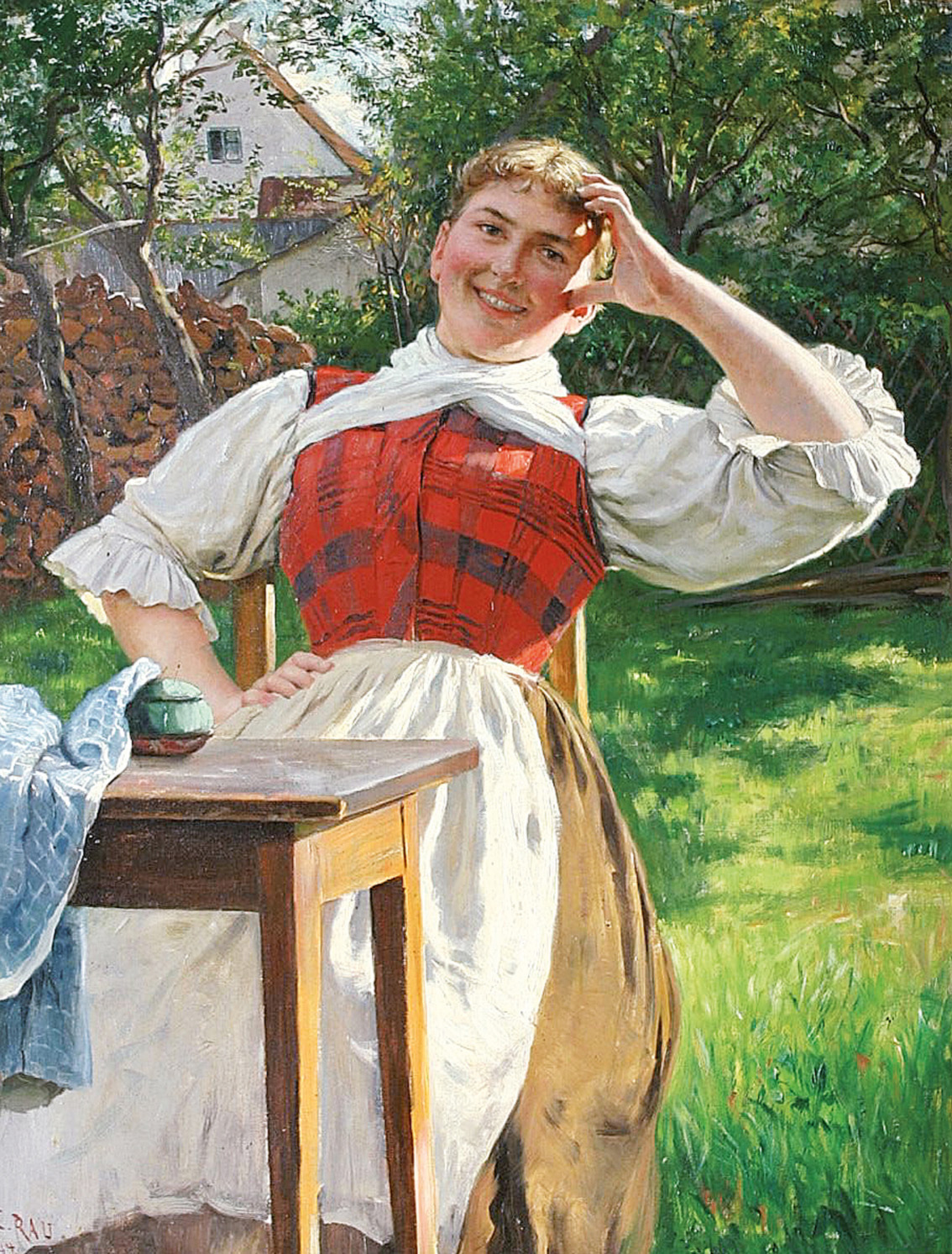 A young girl sewing in the garden