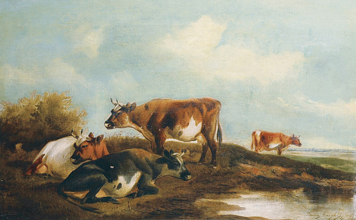 Kühe an einer Wasserstelle