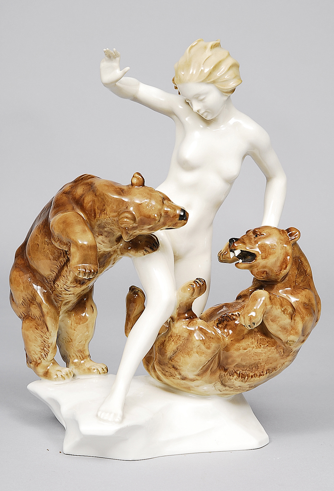 An art nouveau group 'female nude with two bears'