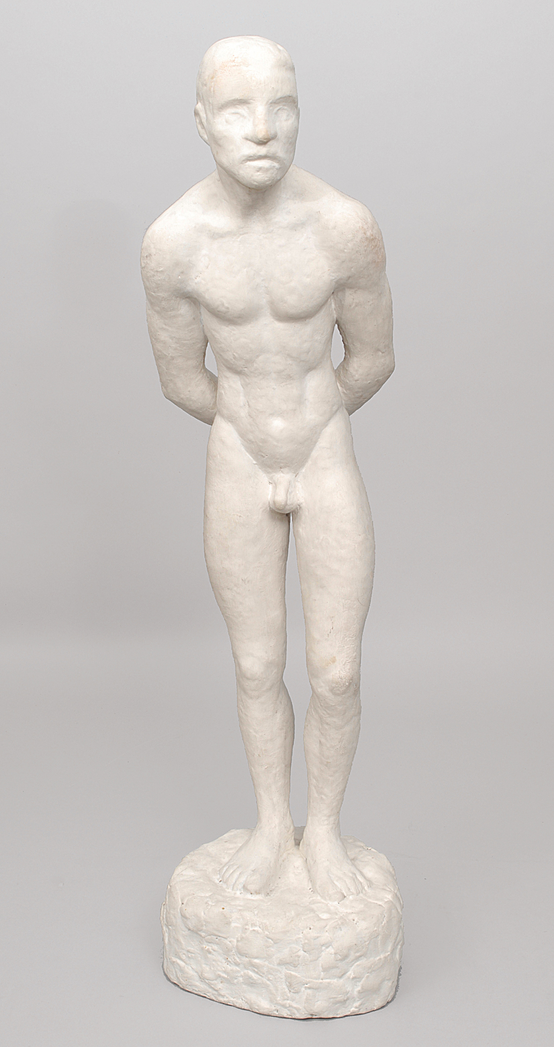 A large figure of a young man