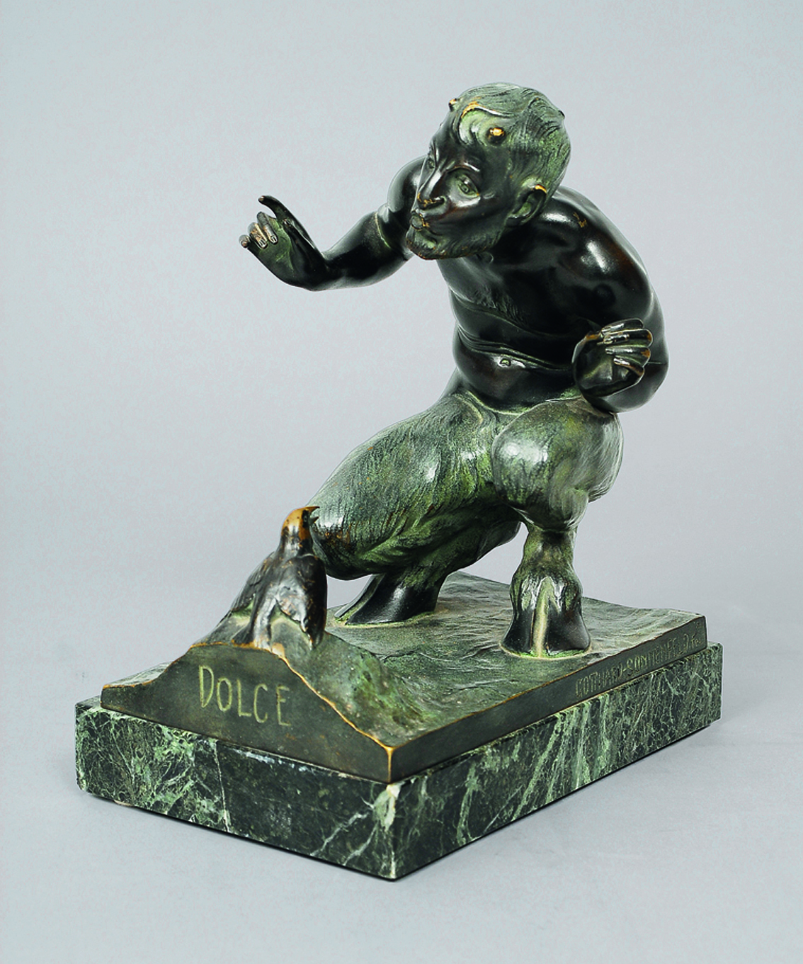 A small bronze figure 'satyr with bird - "Dolce"'