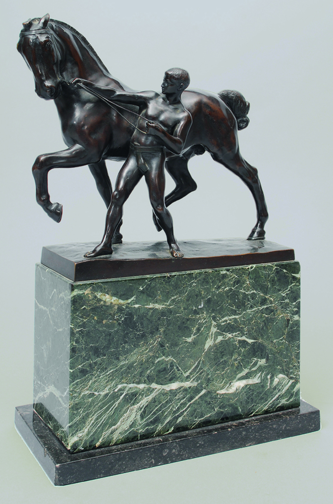 Rudolf Kaesbach - A classical bronze figure 'horse tamer' A classical bronze figure 'horse tamer'