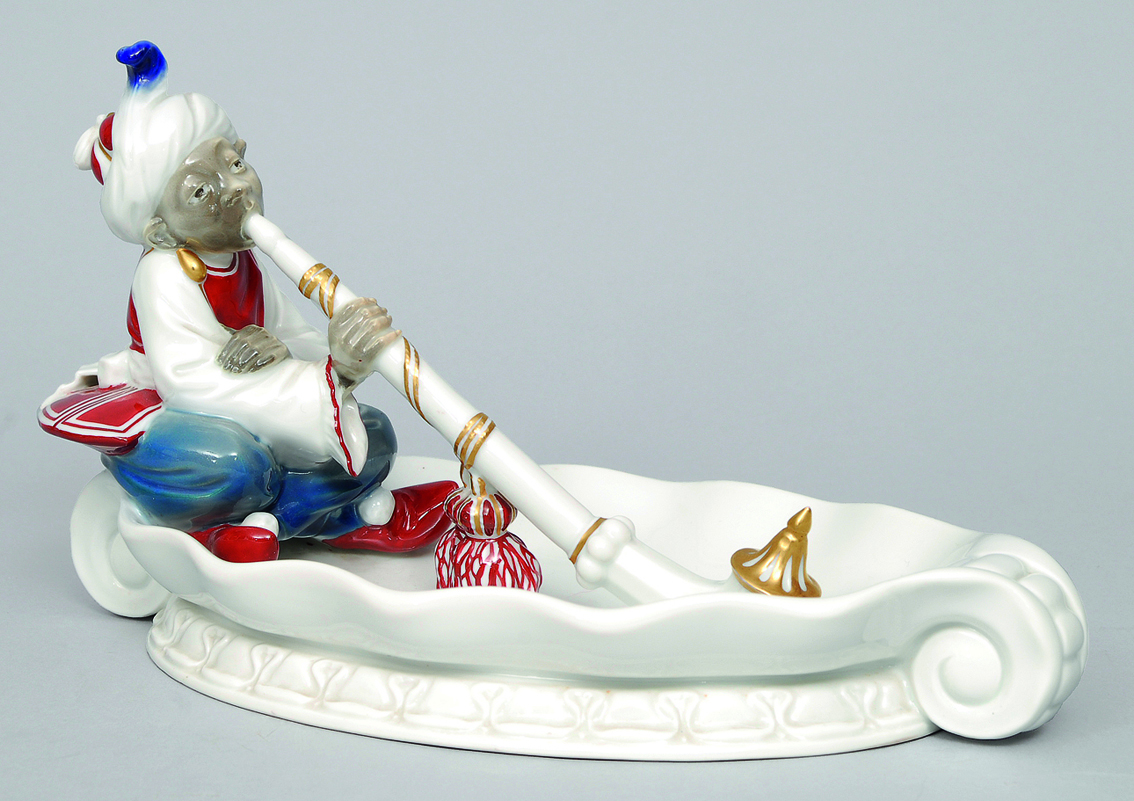 An ash tray with figure of a Turk
