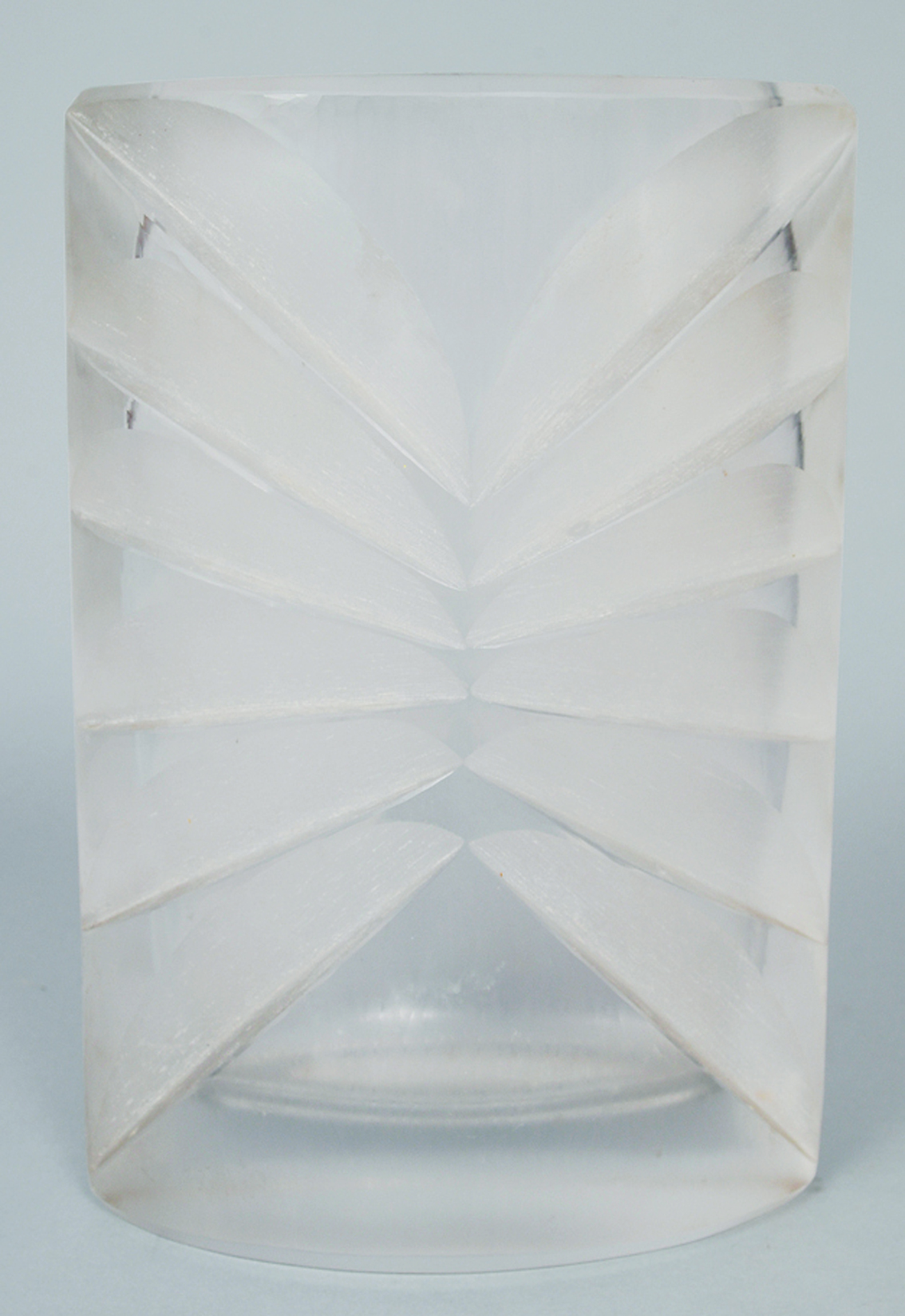 A modern glass vase with geometrical ornament