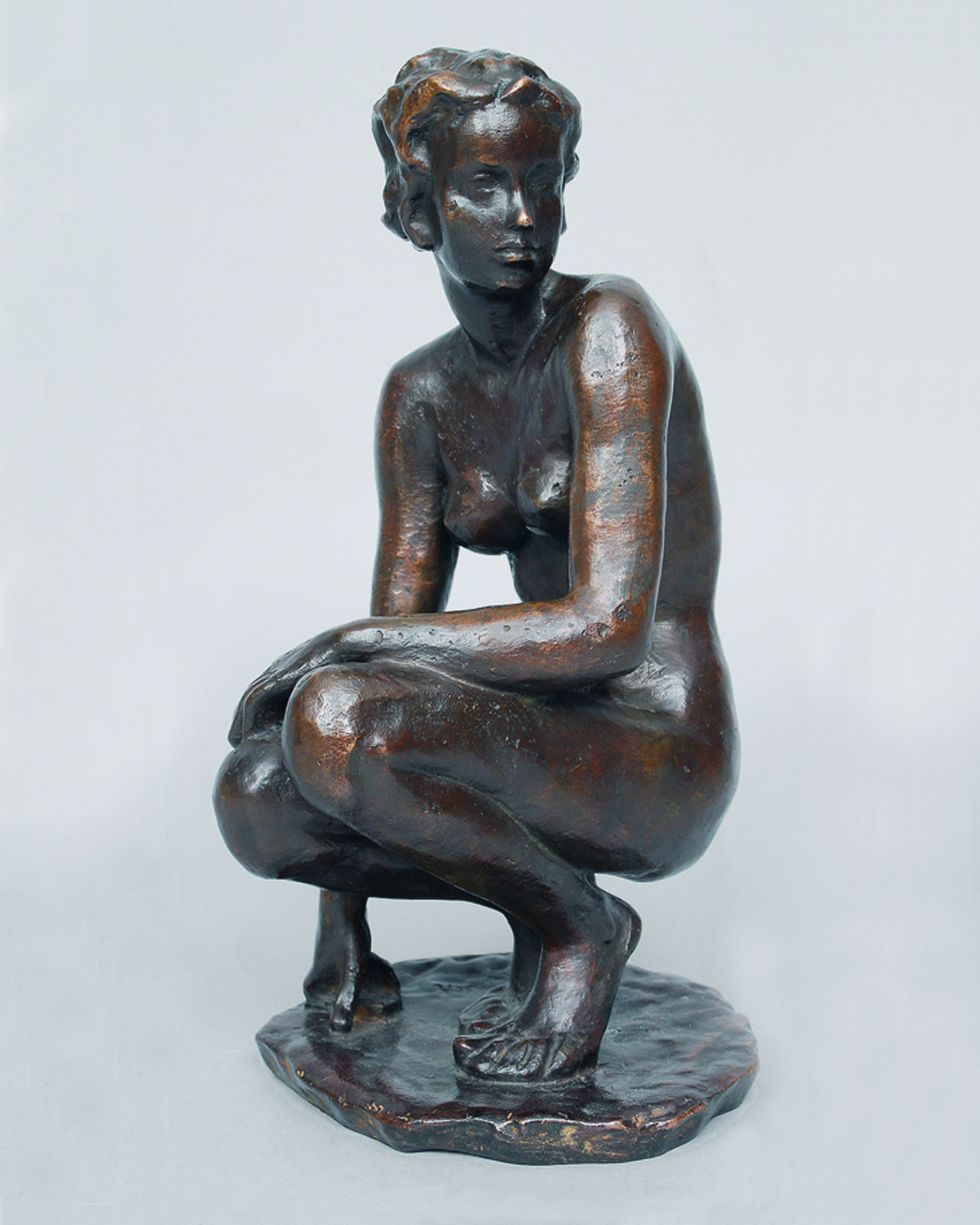 Seltene Bronze-Figur 'Hockende'