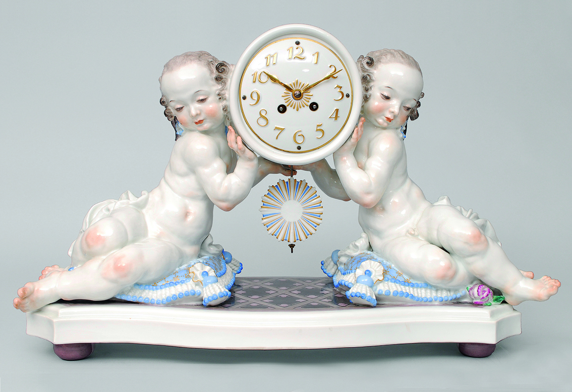 A rare large mantle clock with putti