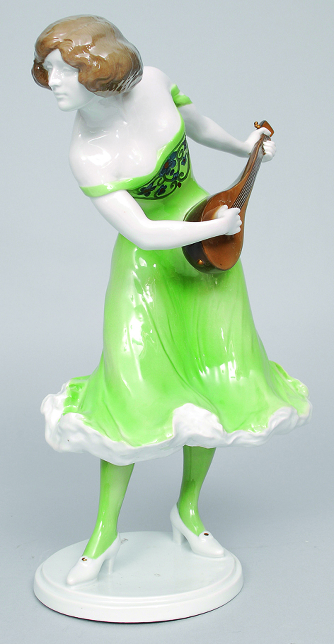 Rudolf Marcuse - A large art nouveau figure of woman playing the mandolin A large art nouveau figure of woman playing the mandolin