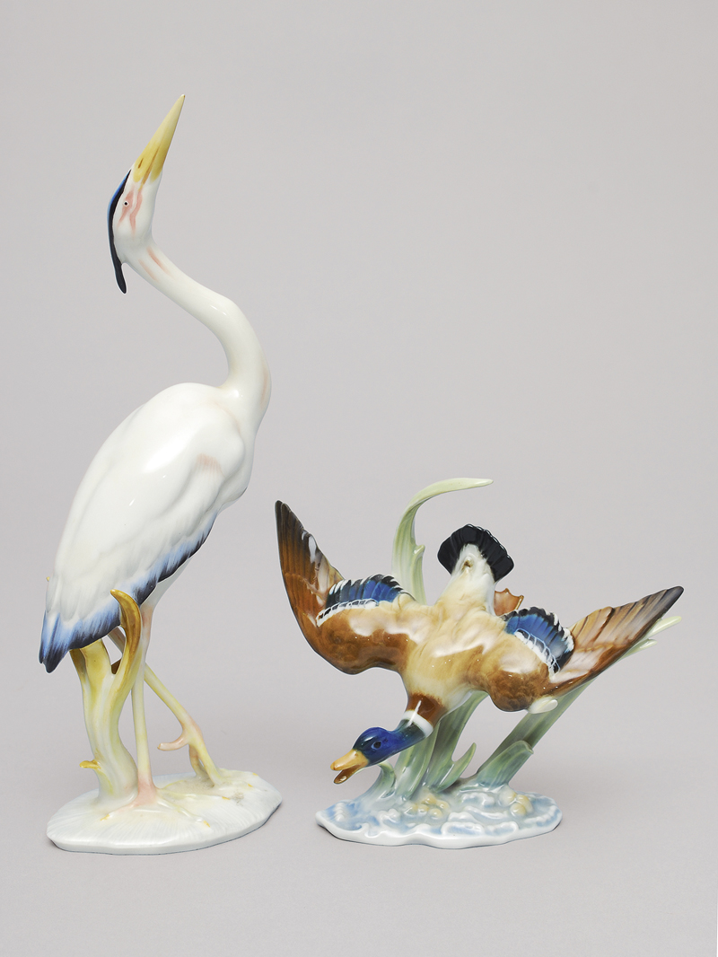 Two water bird figures