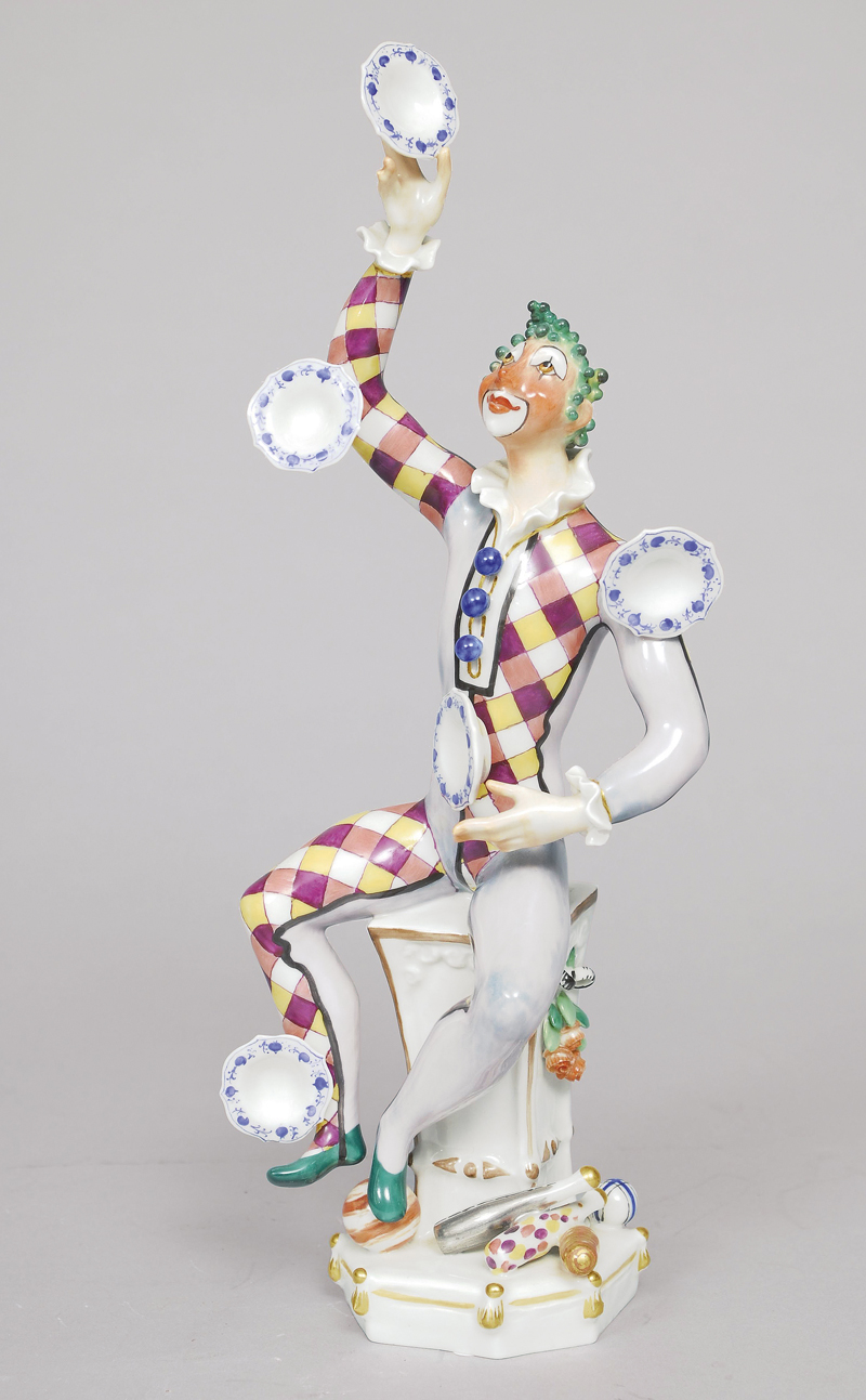 A figure of a juggling clown