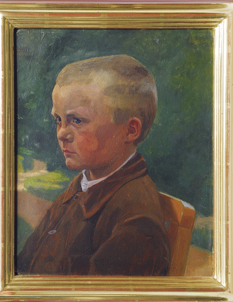 Boy sitting on a chair