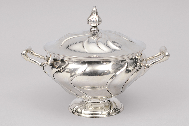 A tureen and cover in the style of chippendale