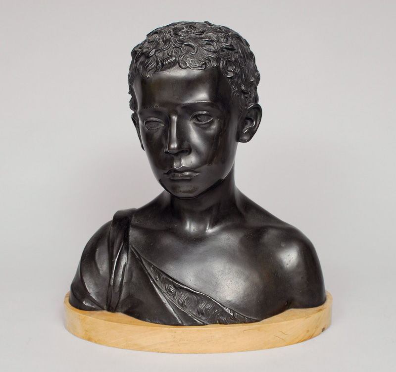 A bronze bust "Young roman boy"