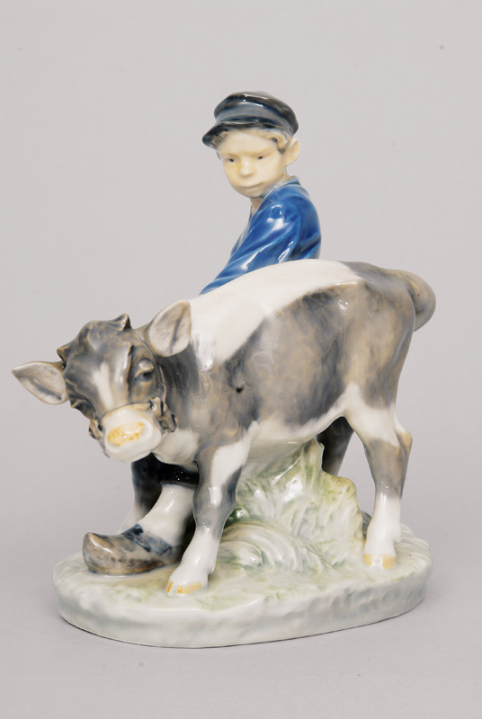 A figurine 'Cowboy with balky calf'