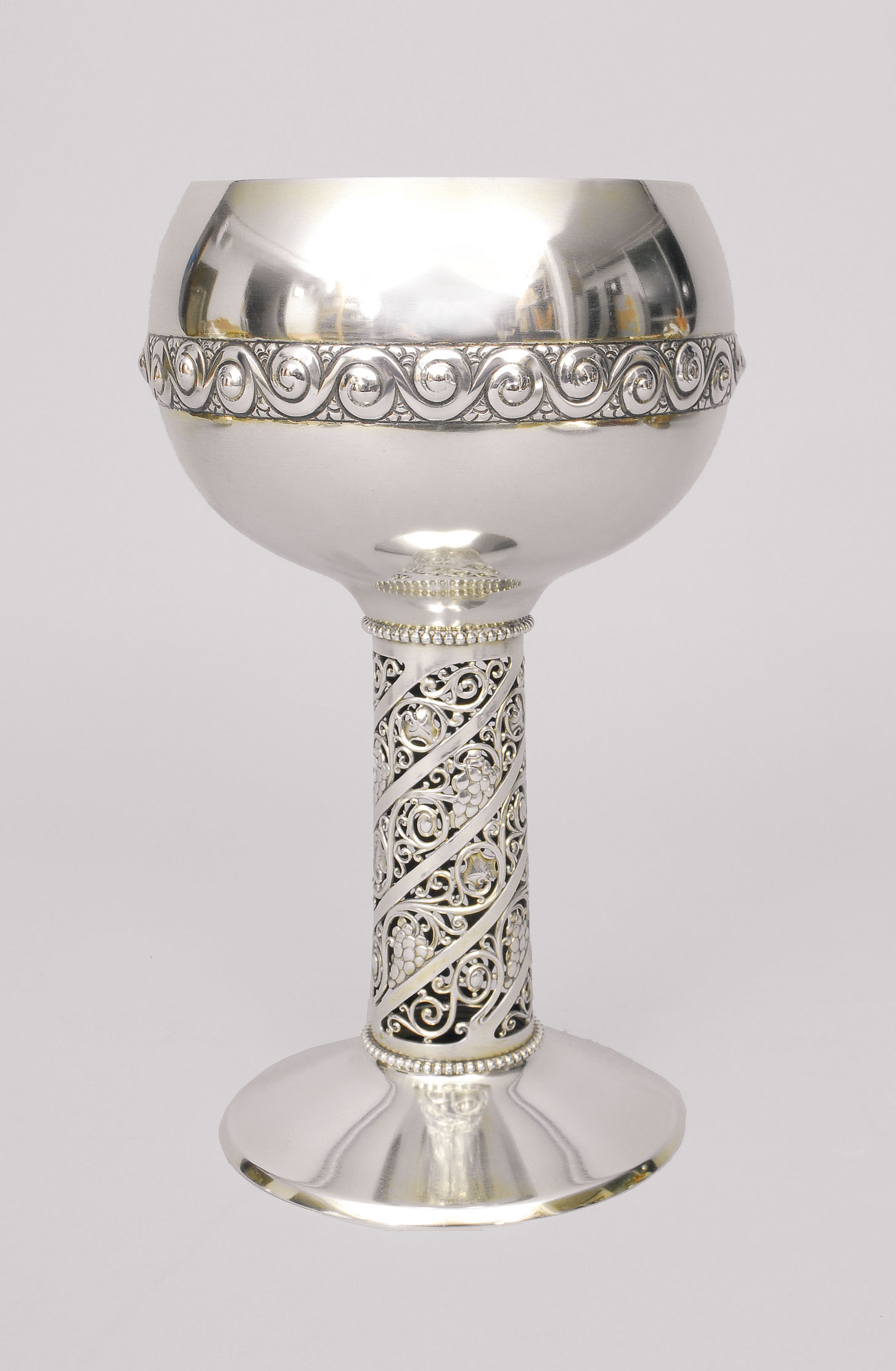An Art-Nouveau goblet with ornaments of grapes