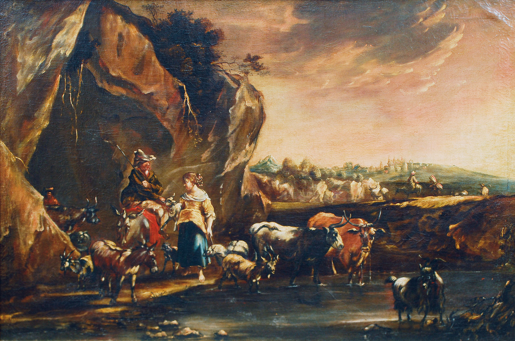 Shepherds with their flock at a watering place