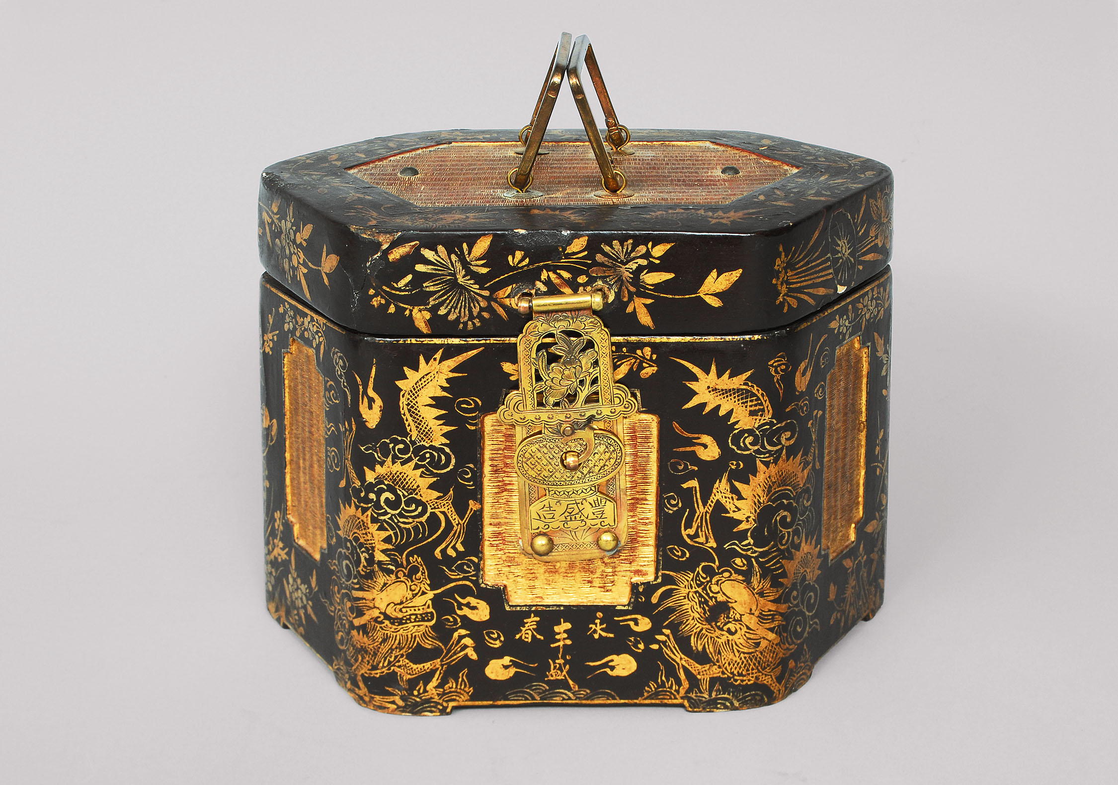 A lacquered box with paintings of flowers