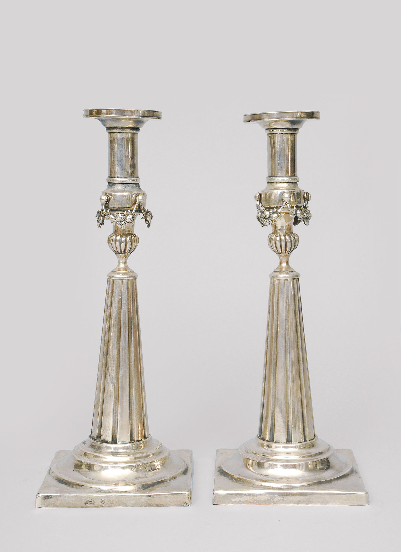 A pair of Empire table candle holders