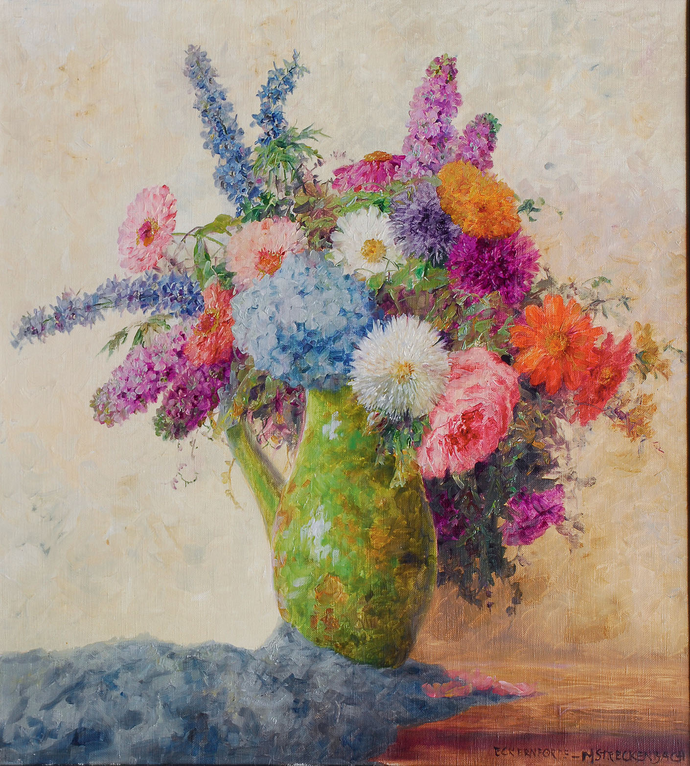 Bouquet of flowers in a green jug