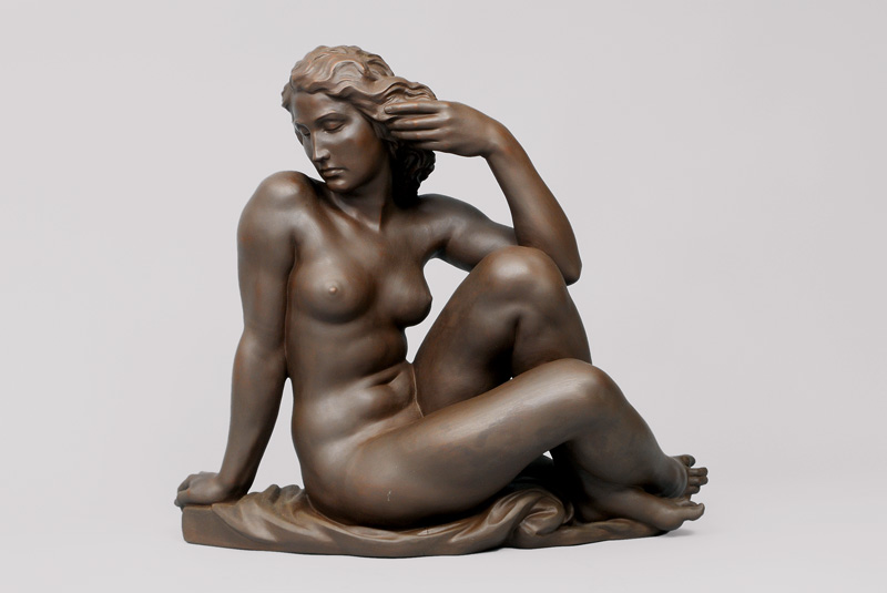 A huge figurine 'bathing woman'