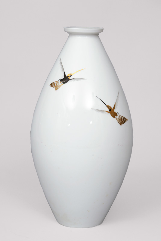 A big Art Deco vase with hummingbird decoration