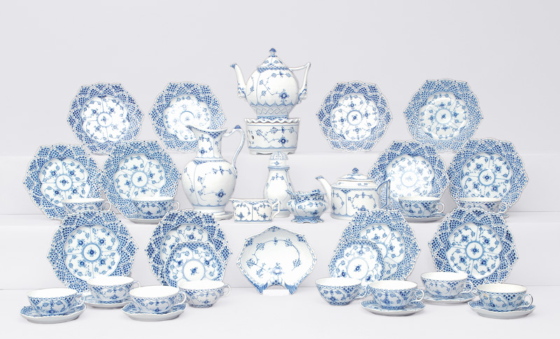- A tea service "Musselmalet" with "fluted full and half lace" for 12 persons A tea service "Musselmalet" with "fluted full and half lace" for 12 persons