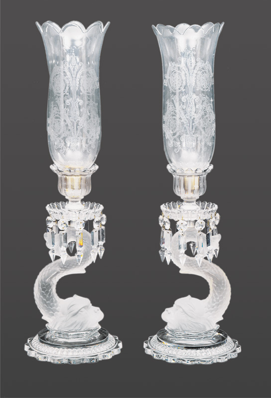 A pair of big Baccarat candel sticks with dolphin