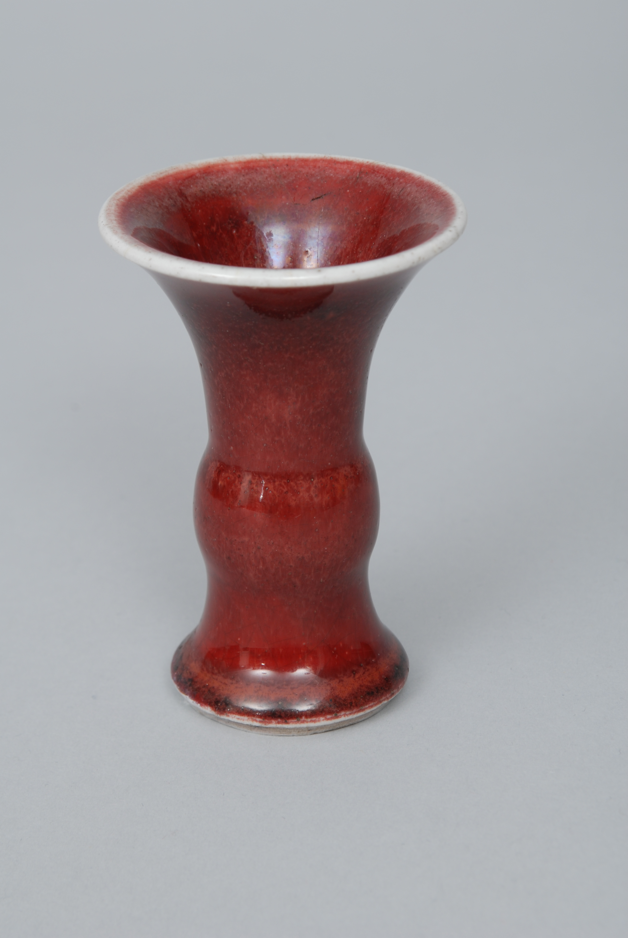 A miniature balsuter-shaped vase