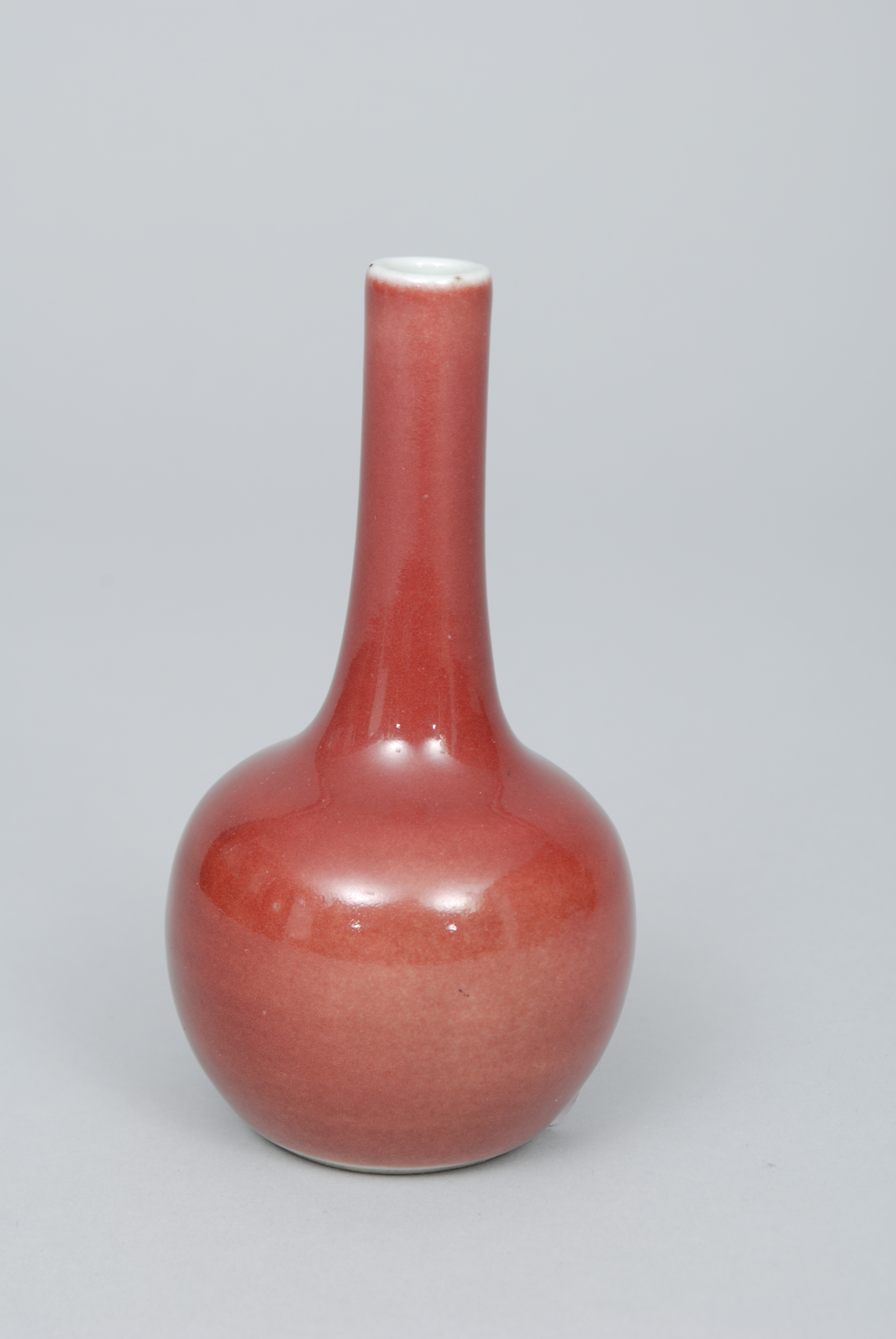 A very small baluster-shaped vase with sang-de-boeuf-glaze
