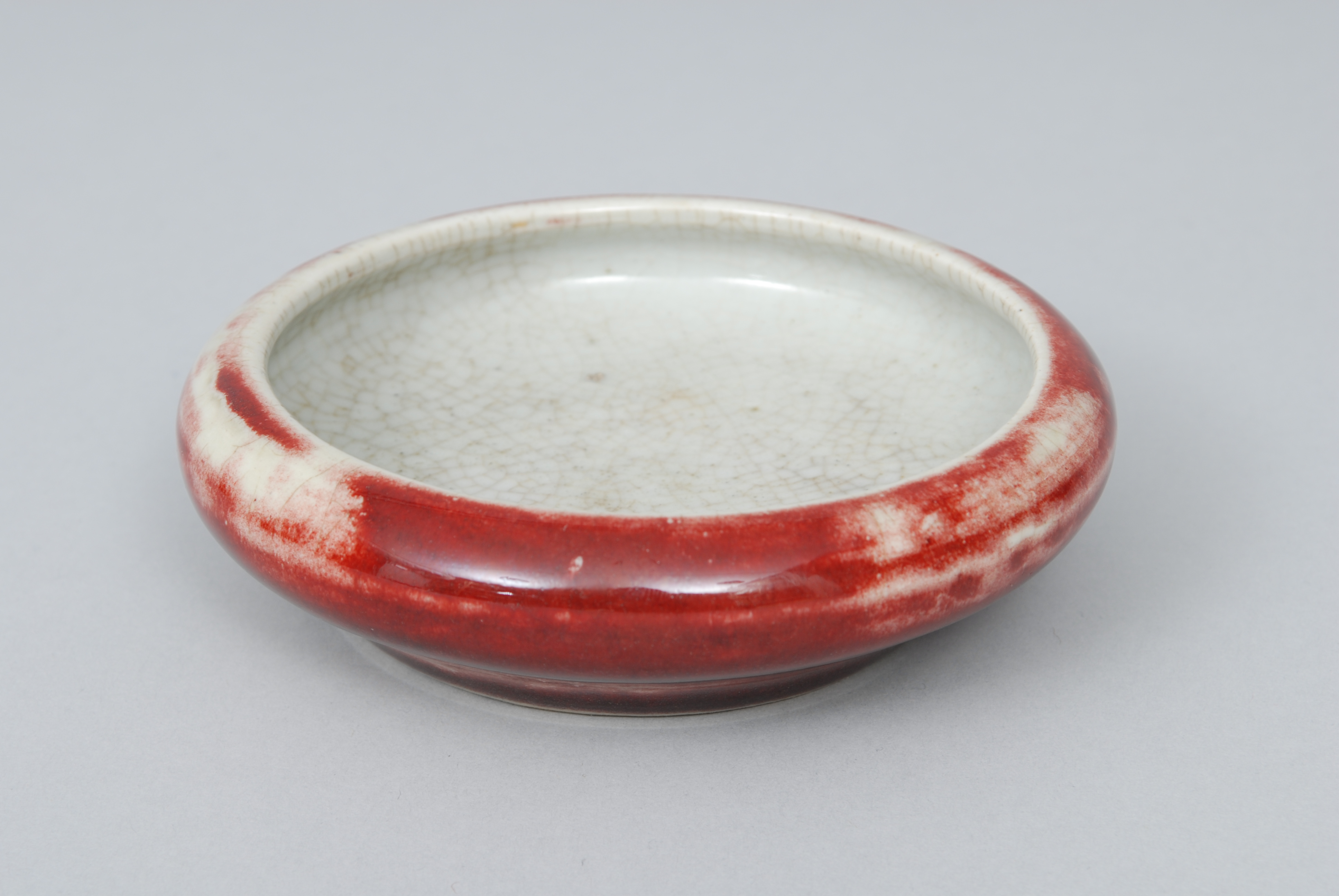 A small bowl with craquelling glaze