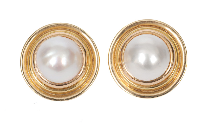 A pair of mabé pearl ear studs
