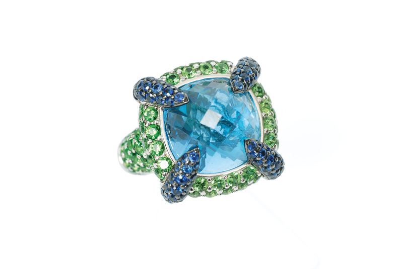 A colourful topaz peridot ring