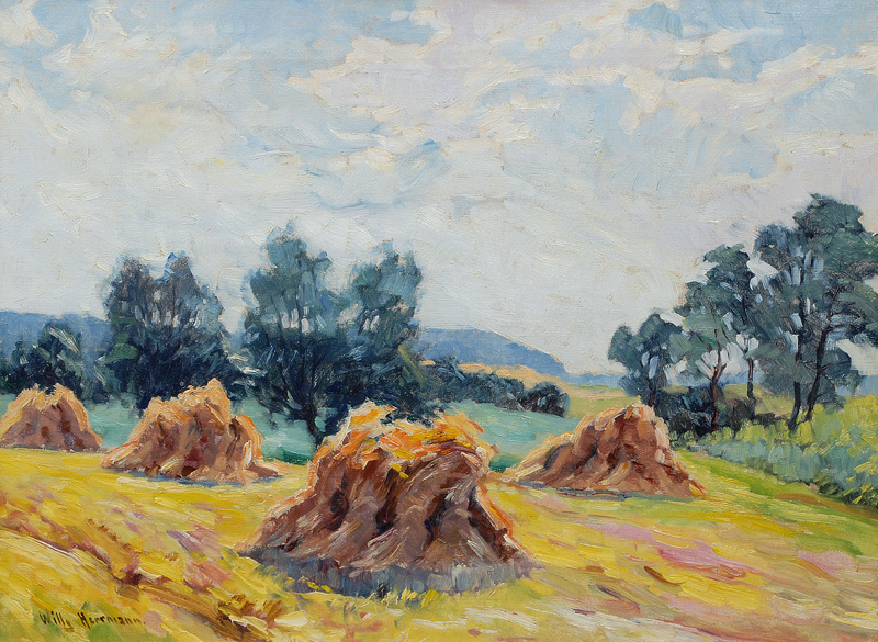 Sommerliche Landschaft mit Korngarben