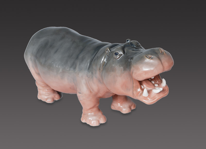 An expressive animal figurine "hippo with opened mouth"