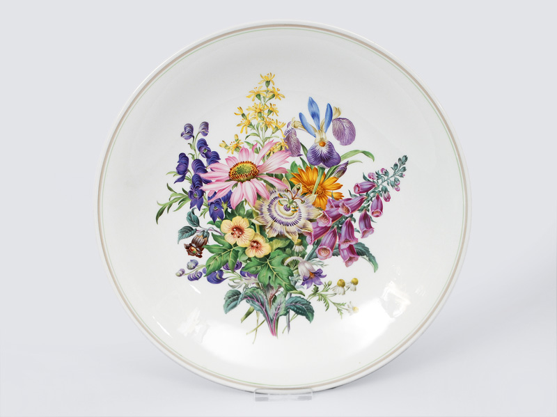 A big plate with detail painted flower bouquet