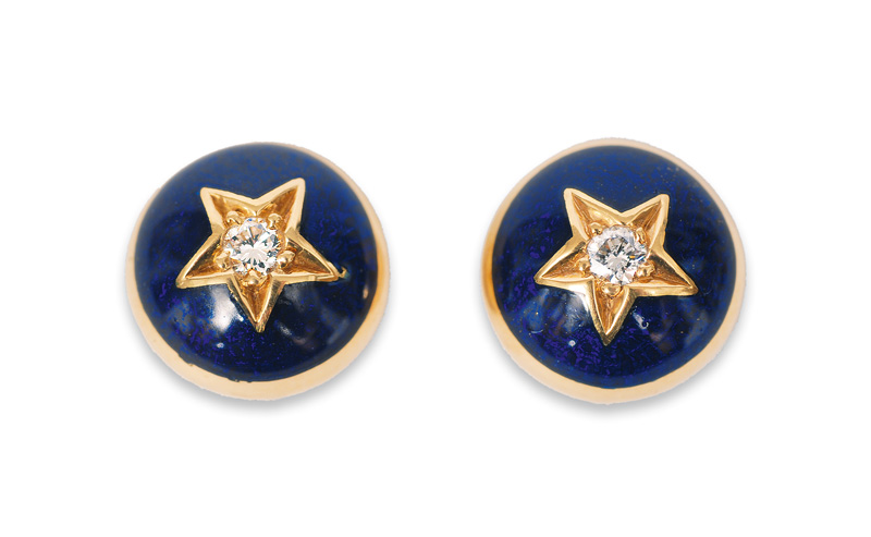 A pair of diamond enamel ear studs