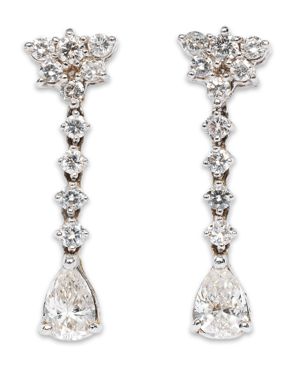 A pair of diamond ear pendants