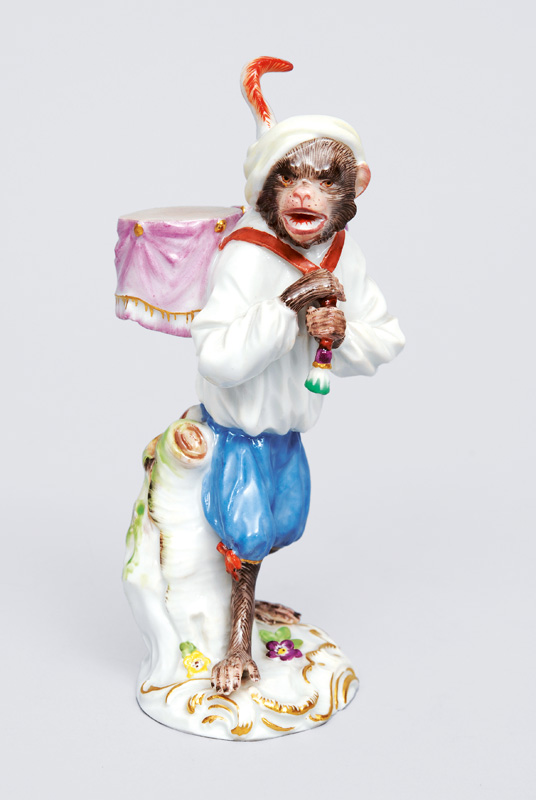 A figurine "kettle drum carrier" of serial "music playing monkeys"